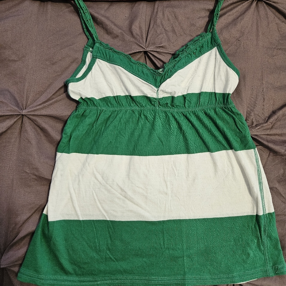 Green and white stripped tank with tie back. Size large. Smoke free home.